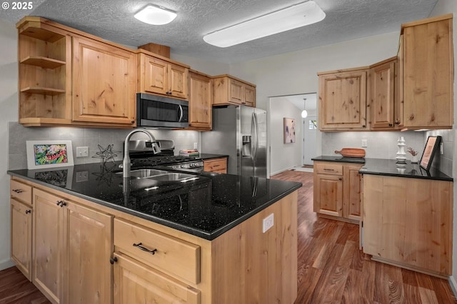 1629 NW Orchard Ave, Gresham, OR 97030 - kitchen with appliances with stainless steel finishes, dark wood-style flooring, a sink, a peninsula, and a textured ceiling
