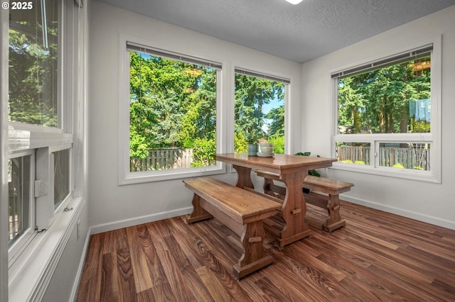 1629 NW Orchard Ave, Gresham, OR 97030 - dining room featuring baseboards, wood finished floors, and a textured ceiling