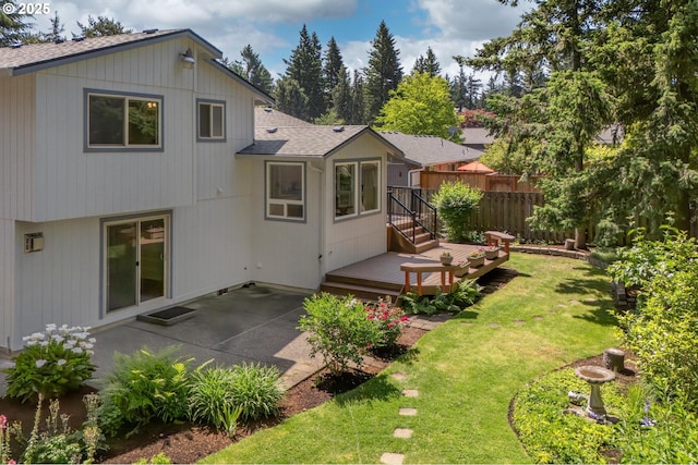 1629 NW Orchard Ave, Gresham, OR 97030 - rear view of property featuring roof with shingles, a patio area, and a deck