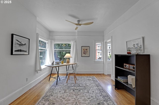 26 NW 22nd Pl, Portland, OR 97210 - office with ceiling fan, light wood-style floors, and baseboards