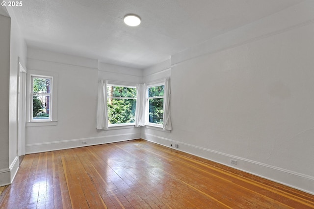 26 NW 22nd Pl, Portland, OR 97210 - empty room with hardwood / wood-style floors and baseboards