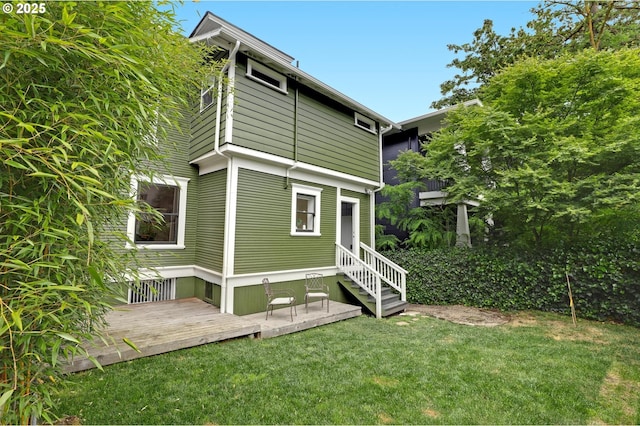26 NW 22nd Pl, Portland, OR 97210 - back of property with a deck and a lawn