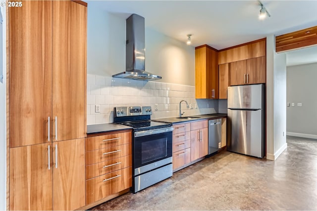325 NE Graham St Unit 10, Portland, OR 97212 - kitchen featuring stainless steel appliances, island range hood, a sink, and dark countertops