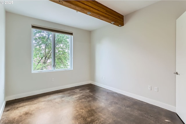 325 NE Graham St Unit 10, Portland, OR 97212 - empty room featuring concrete floors and baseboards