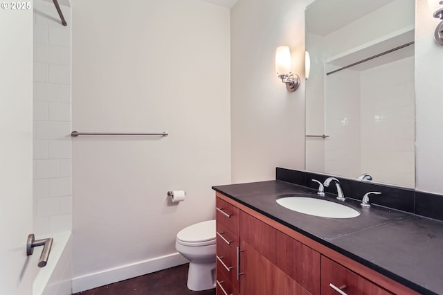 325 NE Graham St Unit 10, Portland, OR 97212 - bathroom with vanity, toilet, baseboards, and  shower combination