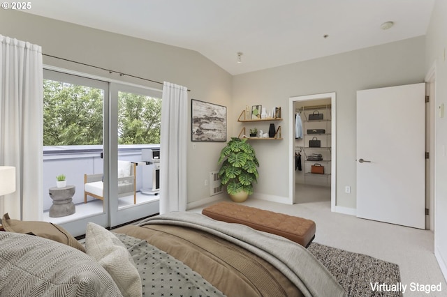 325 NE Graham St Unit 10, Portland, OR 97212 - bedroom featuring access to exterior, lofted ceiling, carpet floors, and baseboards