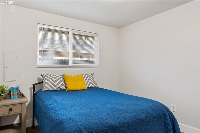 bedroom with hardwood / wood-style flooring