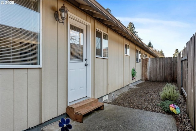 property entrance with a patio area