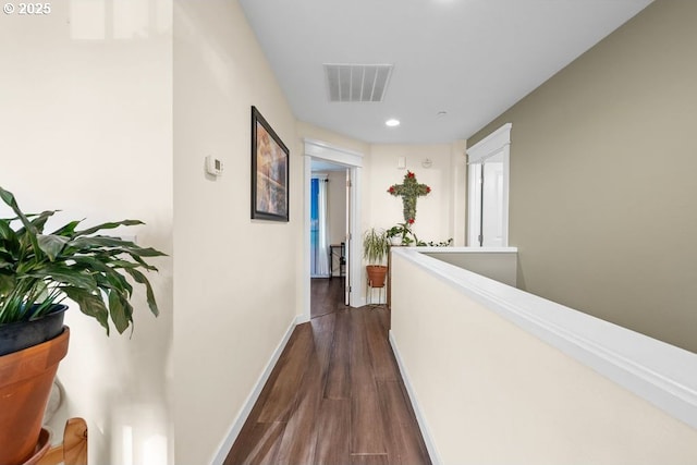 corridor featuring dark hardwood / wood-style flooring