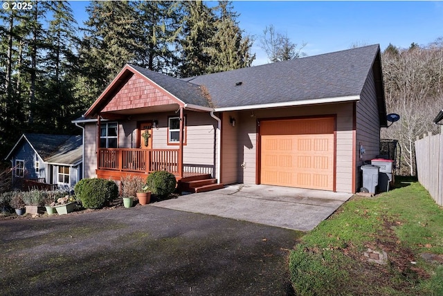 single story home featuring a garage and a front lawn