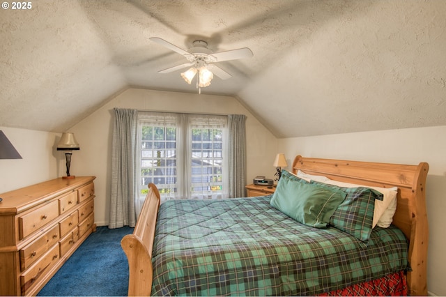 bedroom with a textured ceiling, carpet floors, lofted ceiling, ceiling fan, and baseboards