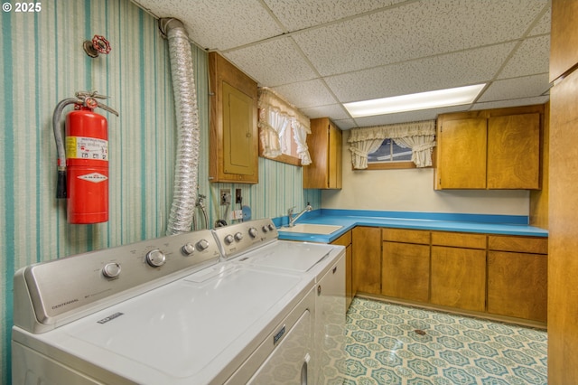 laundry room featuring cabinet space and independent washer and dryer