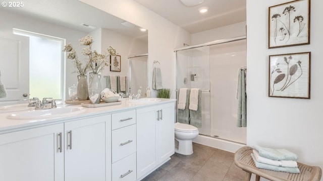 3447 SW Thomas Ave, Gresham, OR 97080 - bathroom featuring a shower stall, double vanity, tile patterned floors, and recessed lighting