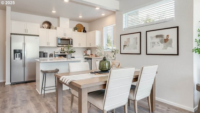 3447 SW Thomas Ave, Gresham, OR 97080 - dining space with light wood-type flooring and recessed lighting