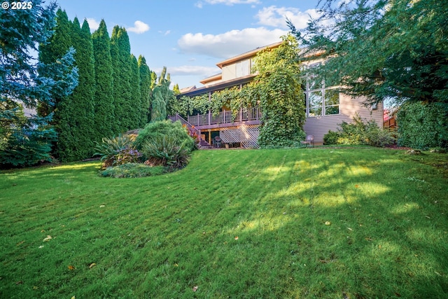 view of yard featuring a deck