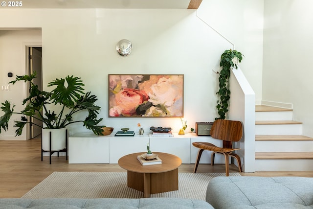 interior space featuring stairs and wood finished floors