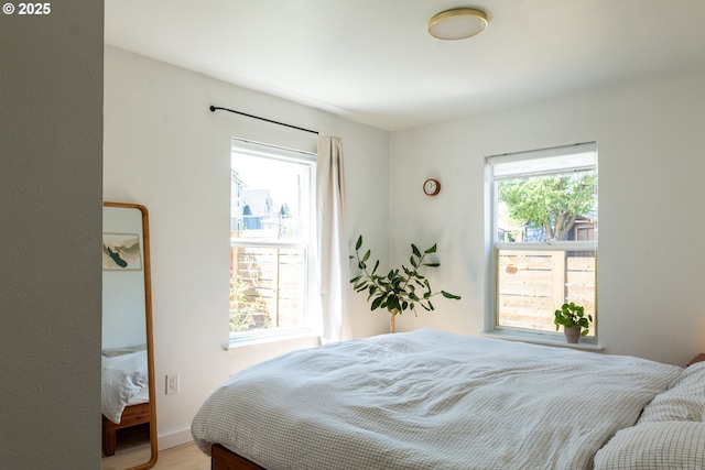 bedroom featuring wood finished floors