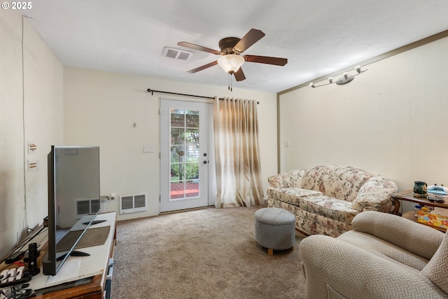 12791 Sutherland Rd, Swisshome, OR 97480 - living area with carpet flooring and ceiling fan