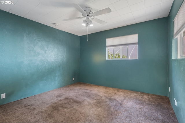 12791 Sutherland Rd, Swisshome, OR 97480 - spare room with carpet flooring, a ceiling fan, and a smoke detector