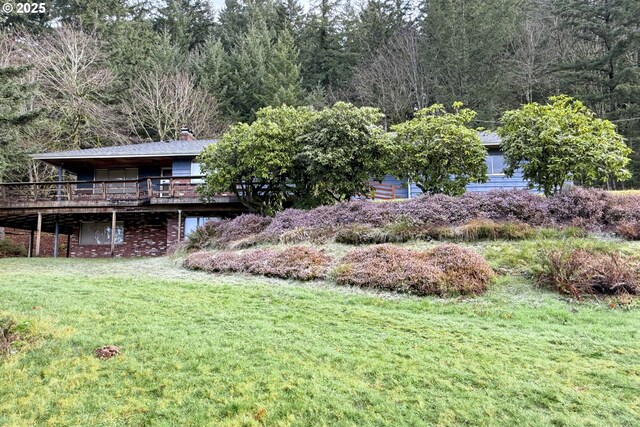 view of yard with a wooden deck