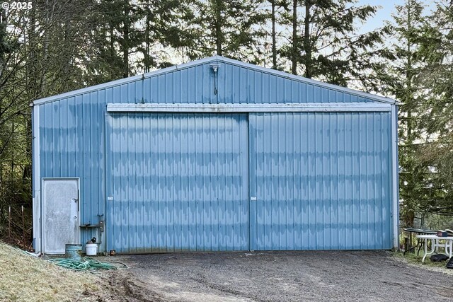 view of outbuilding featuring an outdoor structure