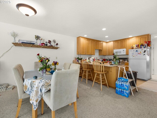 107 Sunset Blvd, Cannon Beach, OR 97110 - dining space featuring recessed lighting and light colored carpet