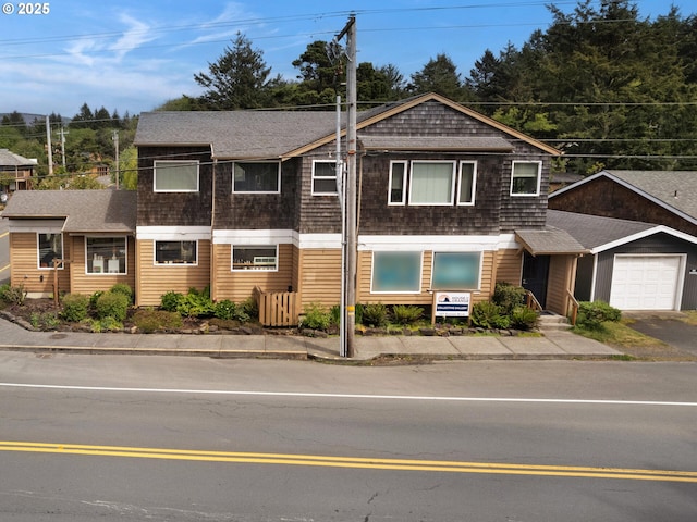 107 Sunset Blvd, Cannon Beach, OR 97110 - view of front facade featuring a shingled roof and driveway
