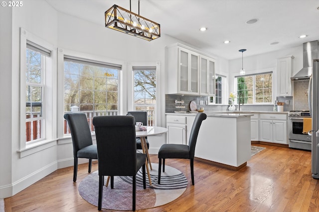 dining room featuring light hardwood / wood-style flooring