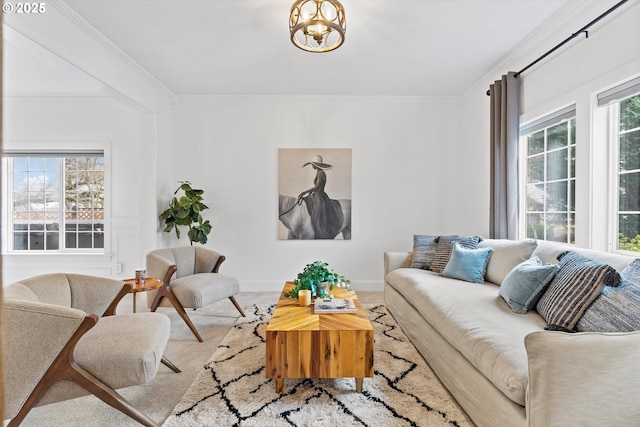 living room featuring crown molding and carpet