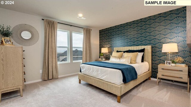 bedroom featuring carpet