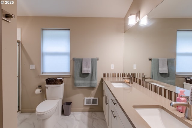 full bath featuring visible vents, marble finish floor, and a sink