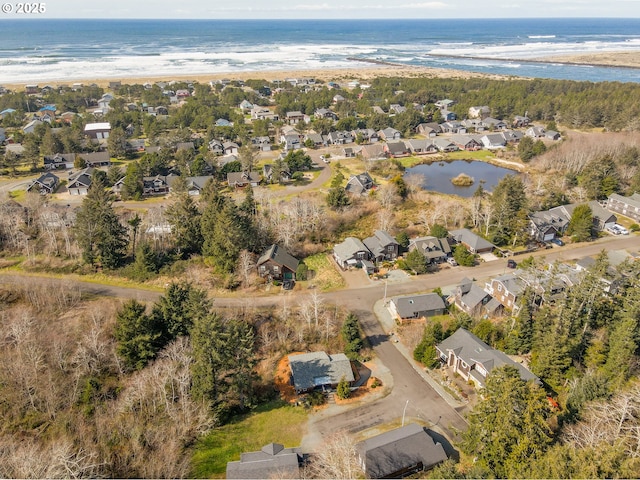 bird's eye view featuring a residential view and a water view