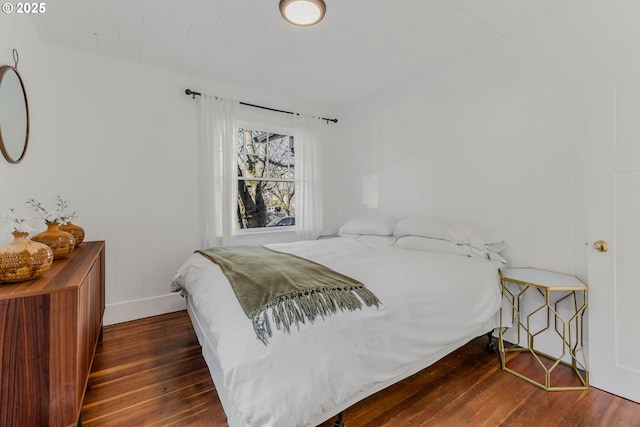 bedroom featuring dark wood-type flooring