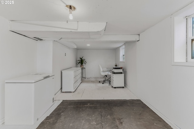 basement with refrigerator