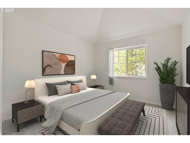 carpeted bedroom featuring baseboards and lofted ceiling