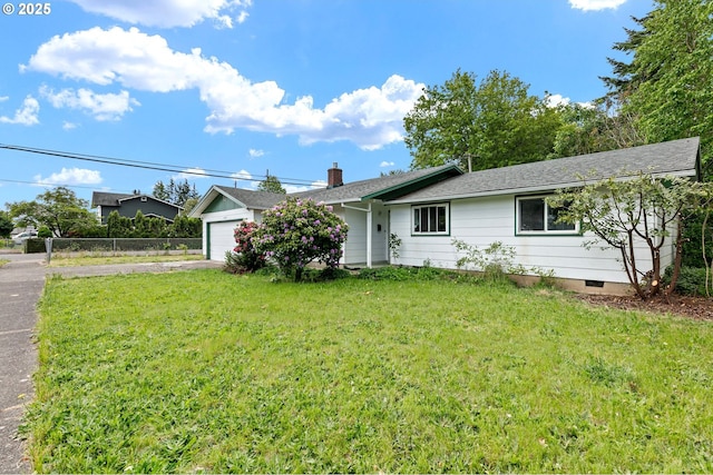view of front of property with asphalt driveway, an attached garage, a shingled roof, and crawl space