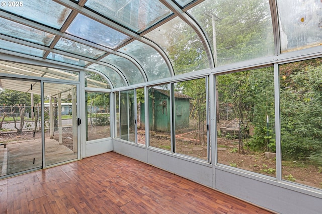 unfurnished sunroom featuring healthy amount of natural light