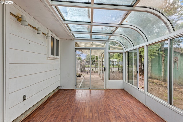 unfurnished sunroom featuring plenty of natural light