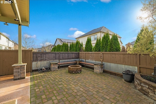 view of patio featuring an outdoor fire pit