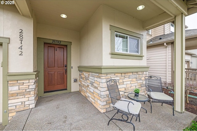 doorway to property featuring a porch