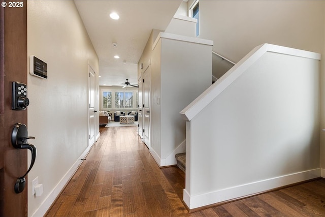 hallway featuring dark wood-type flooring