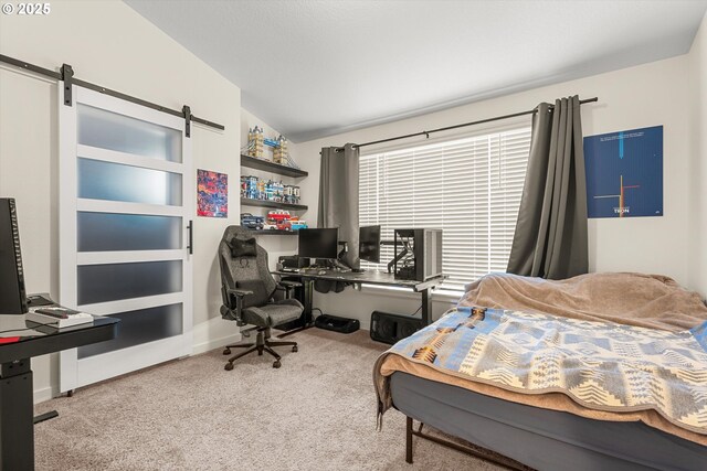 carpeted bedroom featuring a barn door and vaulted ceiling