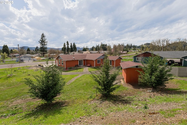 13130 Lookingglass Rd, Winston, OR 97496 - view of yard with fence, driveway, and an outdoor structure