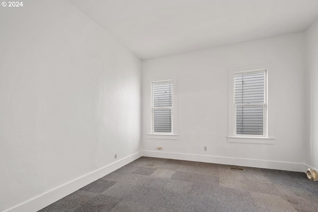 empty room featuring carpet