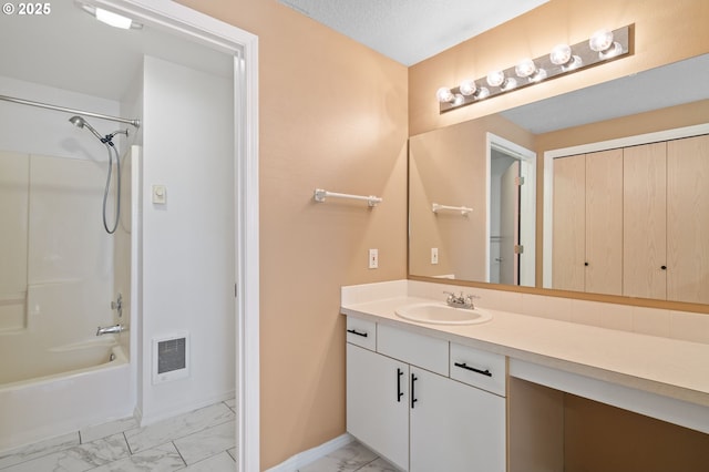 bathroom featuring vanity and shower / bath combination