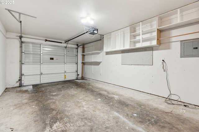 garage featuring a garage door opener and electric panel