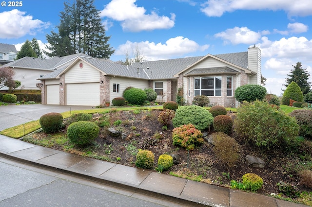 ranch-style home featuring an attached garage, a chimney, concrete driveway, and brick siding