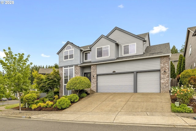 16205 SW Blackbird Dr, Beaverton, OR 97007 - traditional-style home with brick siding, an attached garage, and driveway