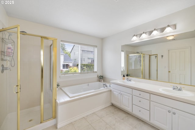 16205 SW Blackbird Dr, Beaverton, OR 97007 - bathroom featuring a shower stall, a garden tub, double vanity, and tile patterned flooring