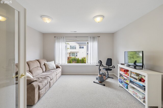 16205 SW Blackbird Dr, Beaverton, OR 97007 - carpeted living area featuring baseboards